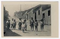 "Street showing homes of the poorer class”